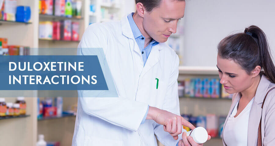 Doctor explaining duloxetine medication interactions to a patient while reviewing a prescription bottle.