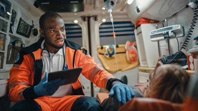 Paramedic providing help during morphine overdose.