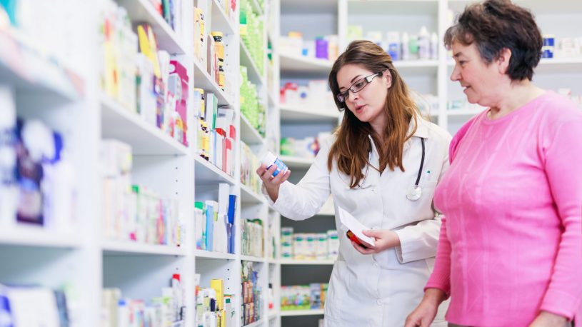 Elderly Woman and Pharmacist