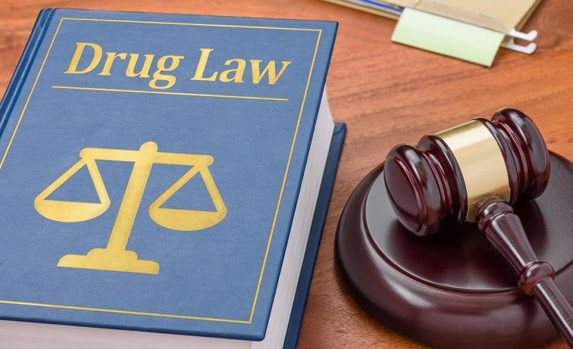 Drug law book representing the war on drugs.