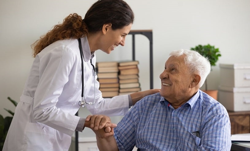 Doctor talking to an old man.