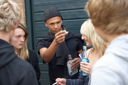 group of teens hanging out in the streets