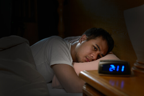 Depressed man suffering from insomnia from Lortab