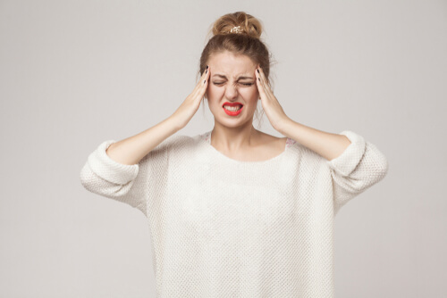 having migraine and headache