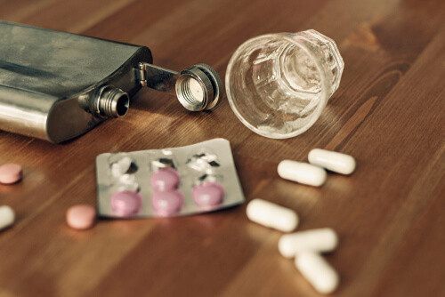  Pharmaceutical pills spilt and alcohol 