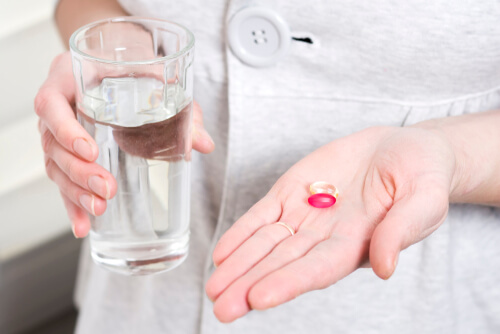 two tablets in hands of woman