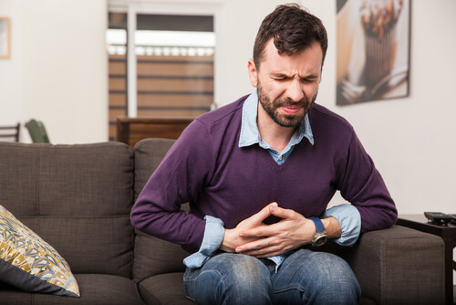 man with terrible stomach ache
