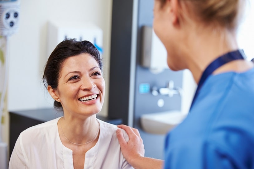 Doctor supports a patient.