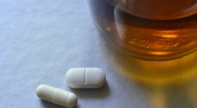 Naproxen pill with whiskey.