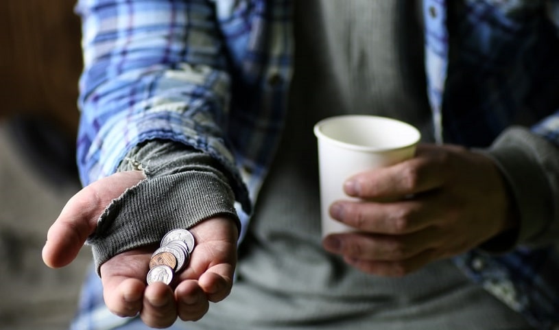Homeless man asking for money.